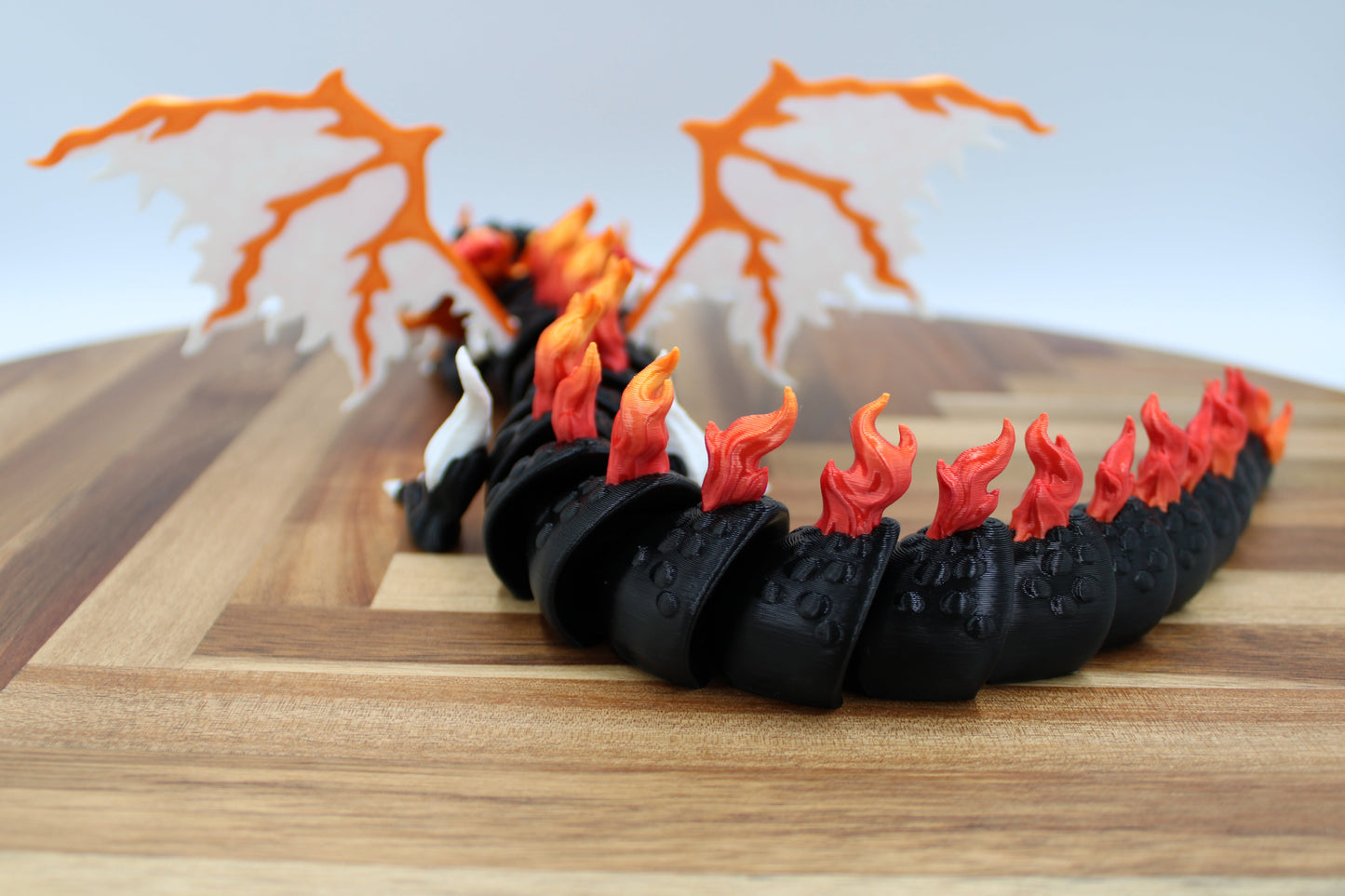 Emberon the Charred Fang