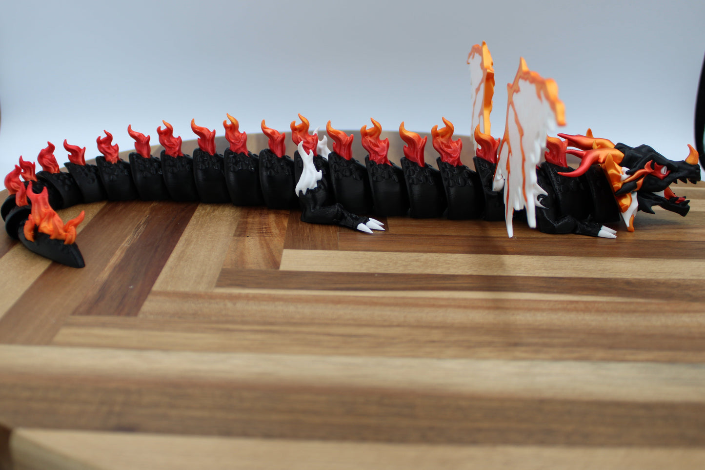 Emberon the Charred Fang